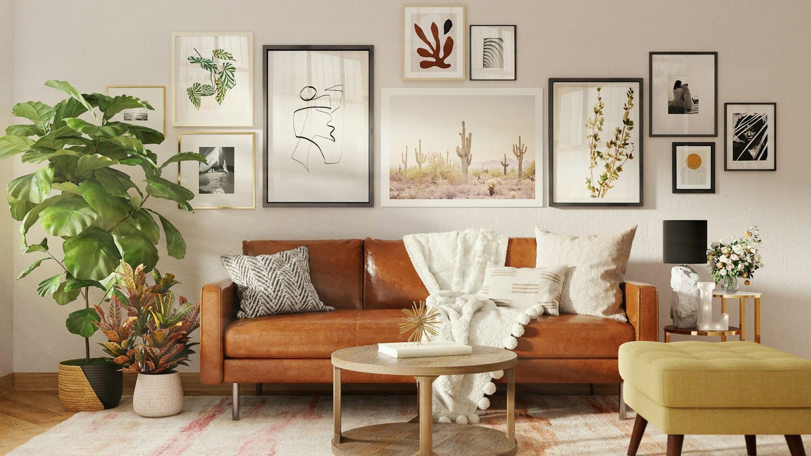 Warm living room with an eclectic gallery wall of framed prints above a leather sofa