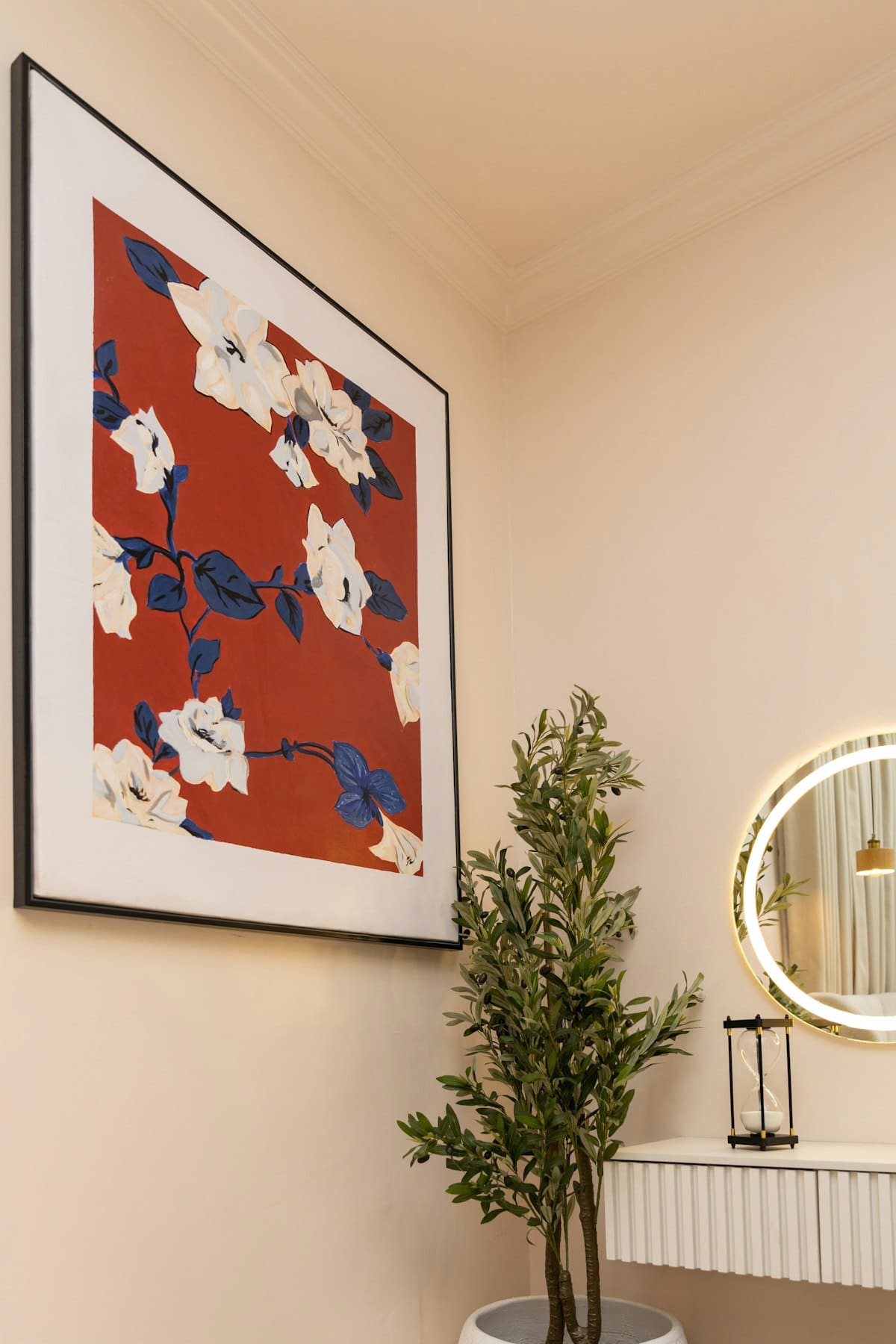 Bold red and white floral print in a black frame